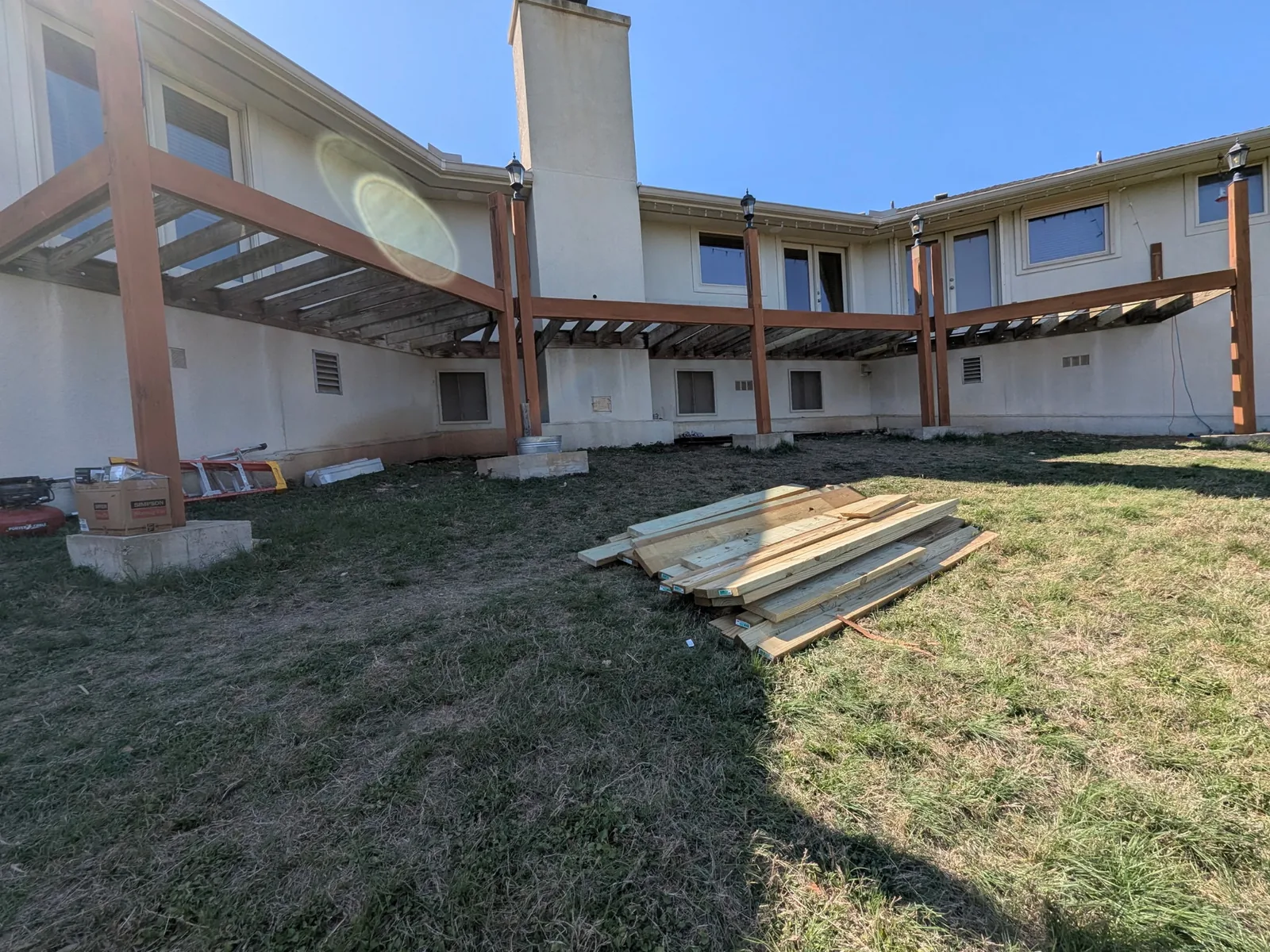 Deck framing exposed after old deck boards were removed