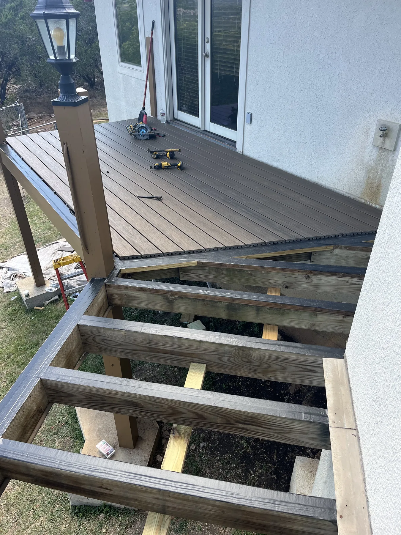 Butyl joist tape installed over deck framing before new Trex boards