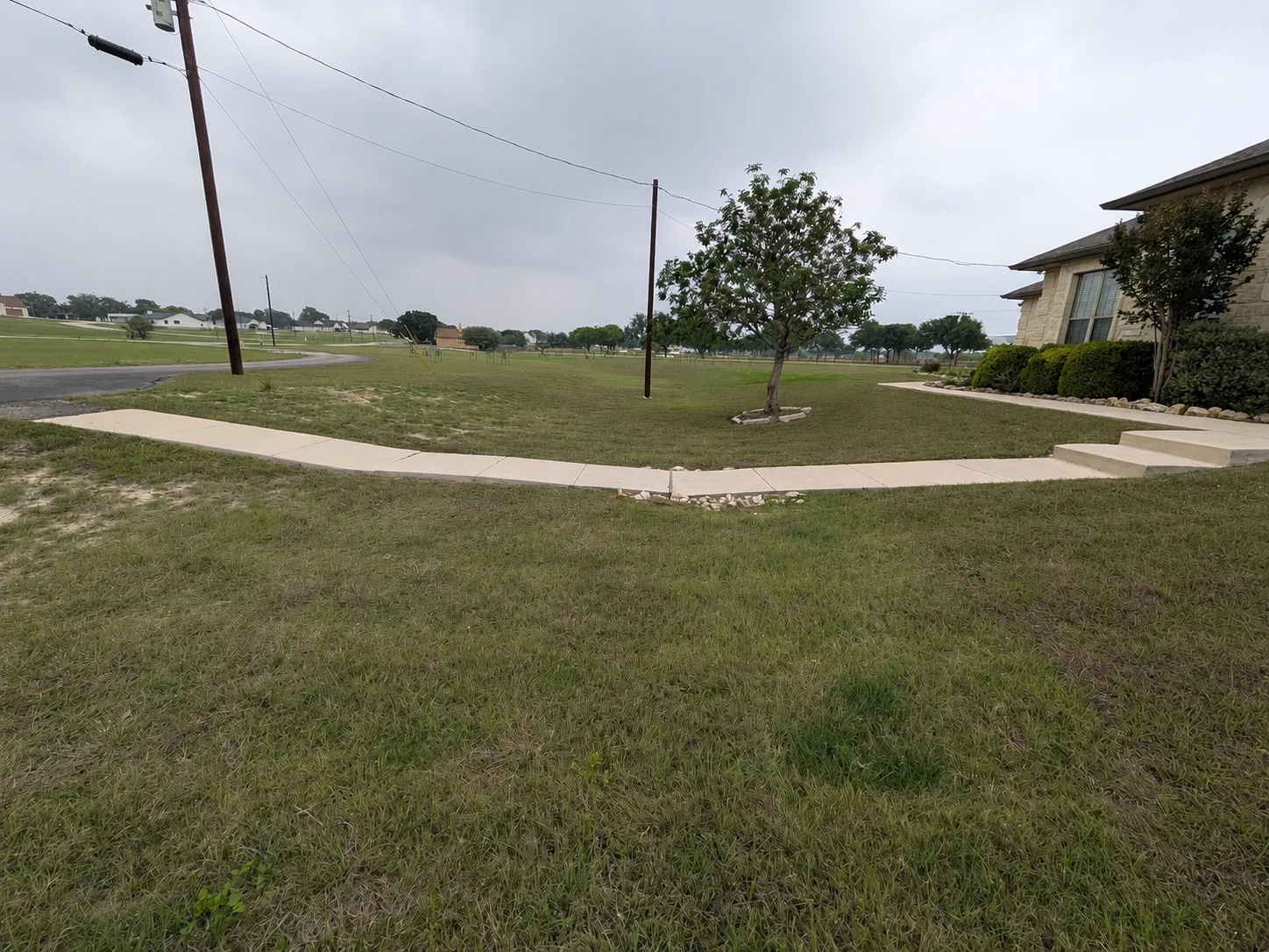 Before: Raised boardwalk bridge for better front access