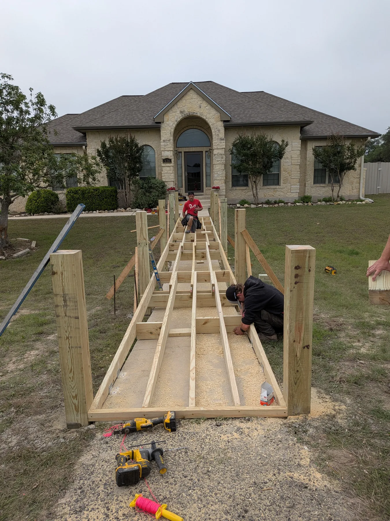 Raised boardwalk framing with joists set 12 inches on center