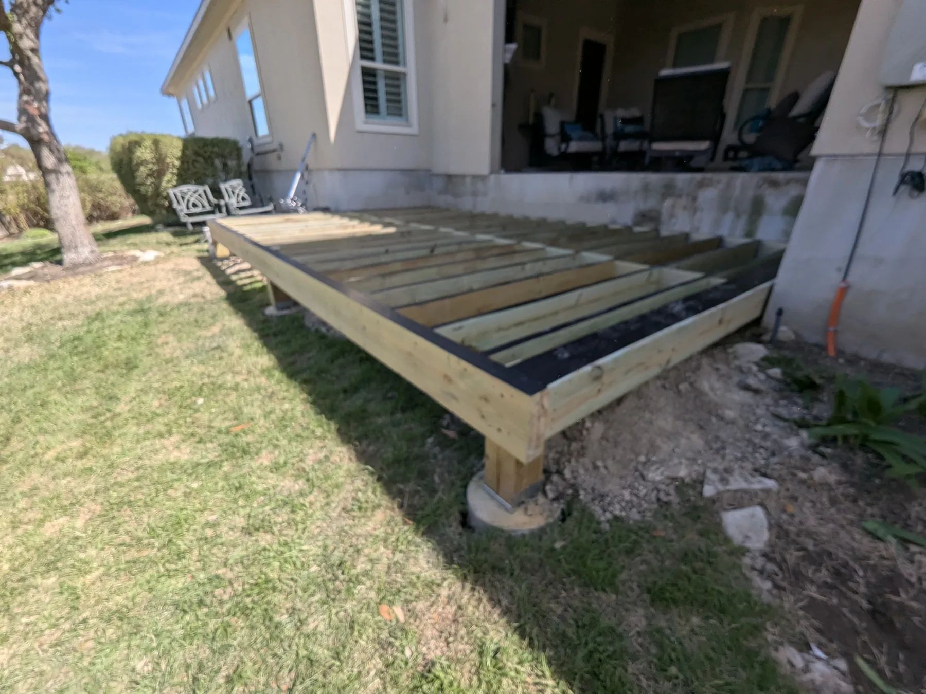 Trex deck framing with joist tape before decking installation